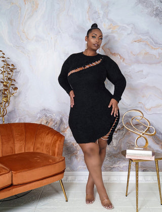 sexy cutout details adorned with a gold-chain trim.