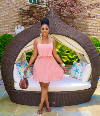Peach pleated mini dress